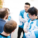 The Cloud9 LCS team, with LemonNation out of uniform, at the LCS playoffs, by Riot Games. Source